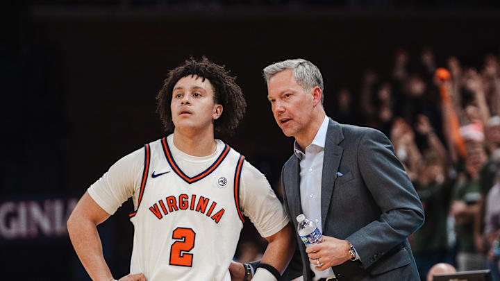 Feb 3, 2026; Charlottesville, Virginia, USA; Virginia Cavaliers guard Chance Mallory (2) talks with head coach Ryan Odom in the second half against the Pittsburgh Panthers at John Paul Jones Arena. Mandatory Credit: Emily Faith Morgan-Imagn Images
