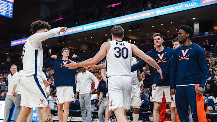 Feb 7, 2026; Charlottesville, Virginia, USA; Virginia Cavaliers guard Dallin Hall (30) celebrates with teammates during the second half against the Syracuse Orange at John Paul Jones Arena. Mandatory Credit: Emily Faith Morgan-Imagn Images