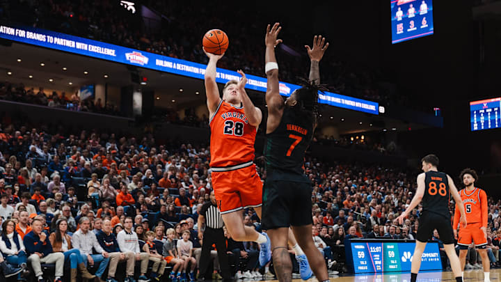 Feb 21, 2026; Charlottesville, Virginia, USA; Virginia Cavaliers forward Thijs de Ridder (28) shoots the ball over Miami (FL) Hurricanes forward Shelton Henderson (7) during the second half at John Paul Jones Arena. Mandatory Credit: Emily Faith Morgan-Imagn Images