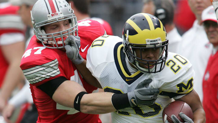 A.J. Hawk thinks the NCAA was right to not too hard on Michigan in its punishment, to avoid hurting current players.