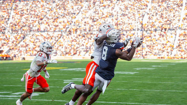 Auburn Tigers wide receiver Cam Coleman (8) catches a touchdown pass as Auburn Tigers take on Mercer Bears at Jordan-Hare Stadium in Auburn, Ala. on Saturday, Nov. 22, 2025. Auburn Tigers lead the Mercer Bears 35-17 at halftime.