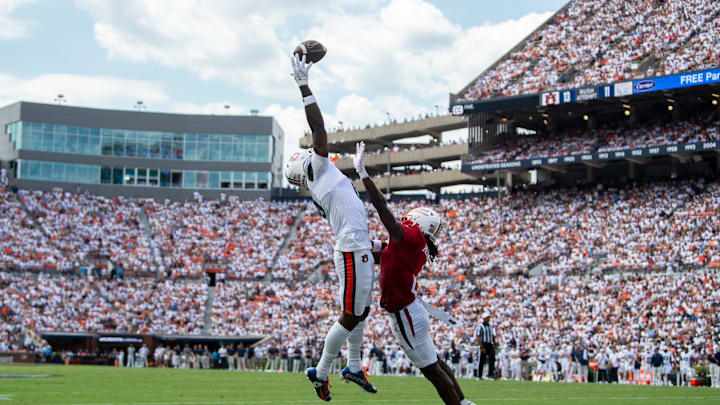 Former Auburn wide receiver Cam Coleman, here straining to catch a pass, was the consensus top portal prospect among a group of interviewed coaches. 