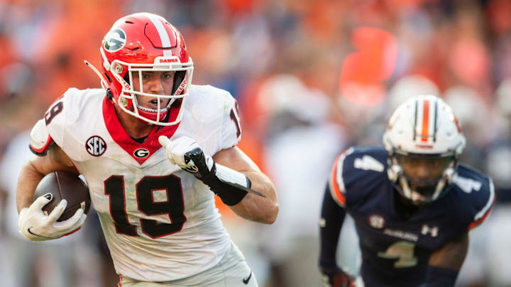 Georgia Bulldogs tight end Brock Bowers (19) runs the ball into the end zone after a catch for the game sealing touchdown as Auburn Tigers take on Georgia Bulldogs at Jordan-Hare Stadium in Auburn, Ala., on Saturday, Sept. 30, 2023. Georgia Bulldogs defeated Auburn Tigers 27-20. Georgia Bulldogs tight end Brock Bowers (19) runs the ball into the end zone after a catch for the game sealing touchdown as Auburn Tigers take on Georgia Bulldogs at Jordan-Hare Stadium in Auburn, Ala., on Saturday, Sept. 30, 2023. Georgia Bulldogs defeated Auburn Tigers 27-20.