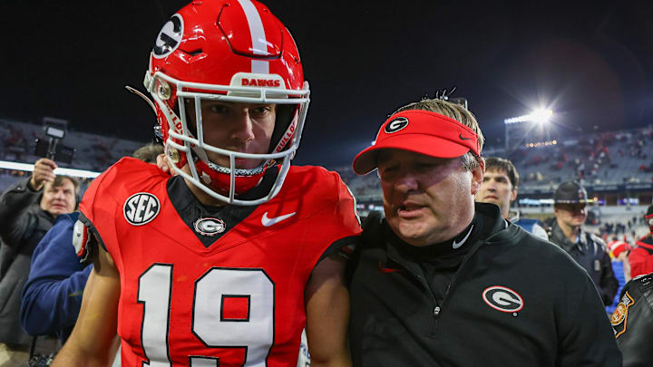 Nov 25, 2023; Atlanta, Georgia, USA; Georgia Bulldogs tight end Brock Bowers (19) and head coach Kirby Smart walk off the field after defeating the Georgia Tech Yellow Jackets at Bobby Dodd Stadium at Hyundai Field. Mandatory Credit: Brett Davis-Imagn Images