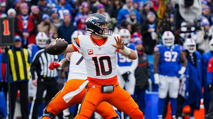 Denver Broncos quarterback Bo Nix (10) throws a pass during the first half of the Buffalo Bills wild card game against the Denver Broncos at Highmark Stadium in Orchard Park on Jan. 12, 2025.
