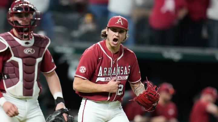 Former Lewisburg Patriots star and current Arkansas pitcher Brady Tygart reacts after the final out of the game against Texas on Feb 17, 2023 at Globe Life Field in Arlington, Texas. Former Lewisburg Patriots star and current Arkansas pitcher Brady Tygart reacts after the final out of the game against Texas on Feb 17, 2023 at Globe Life Field in Arlington, Texas.
