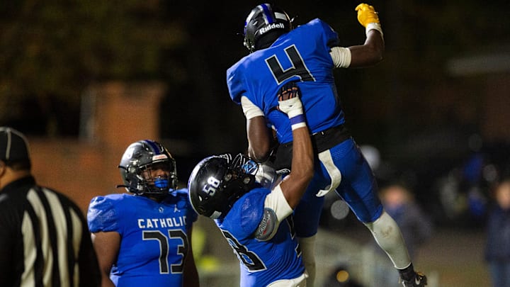 Catholic's Jamarion Williams (4) celebrates his touchdown run at Montgomery Catholic Preparatory School in Montgomery, Ala., on Friday, Nov. 29, 2024. Montgomery Catholic leads Vigor 14-7 at halftime.
