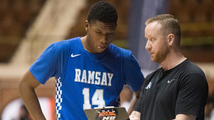 Ramsay coach Denton Johnson talks with Ramsay's Gabriel Allman (14) during a break in the action during the Class 5A boys Southeast Regional semifinal at Garrett Coliseum in Montgomery, Ala., on Saturday, Feb. 15, 2020.

Jc Bballgreenville 13