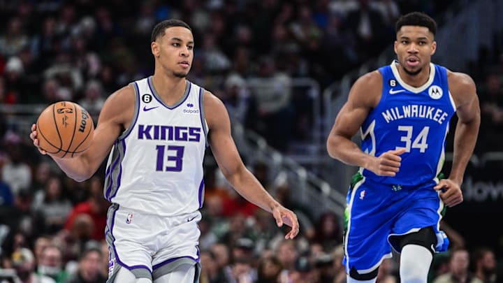 Dec 7, 2022; Milwaukee, Wisconsin, USA; Sacramento Kings forward Keegan Murray (13) brings the ball downcourt against Milwaukee Bucks forward Giannis Antetokounmpo (34) in the third quarter at Fiserv Forum. Mandatory Credit: Benny Sieu-Imagn Images Dec 7, 2022; Milwaukee, Wisconsin, USA; Sacramento Kings forward Keegan Murray (13) brings the ball downcourt against Milwaukee Bucks forward Giannis Antetokounmpo (34) in the third quarter at Fiserv Forum. Mandatory Credit: Benny Sieu-Imagn Images