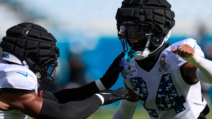 Jacksonville Jaguars cornerback De'Antre Prince (24) is pressured by safety Andre Cisco (5) during the ninth day of an NFL football training camp practice Saturday, Aug. 3, 2024 at EverBank Stadium in Jacksonville, Fla. Today marked the first day of public practice inside the stadium.