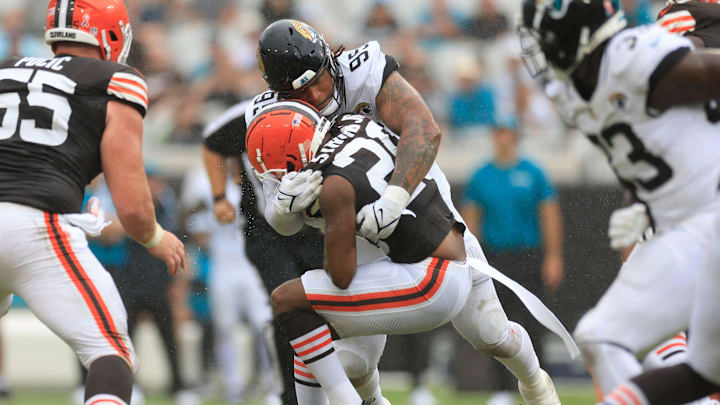 Jacksonville Jaguars defensive tackle Roy Robertson-Harris (95) tackles Cleveland Browns running back Pierre Strong Jr. (20) during the second quarter of an NFL football matchup Sunday, Sept. 15, 2024 at EverBank Stadium in Jacksonville, Fla. [Corey Perrine/Florida Times-Union]