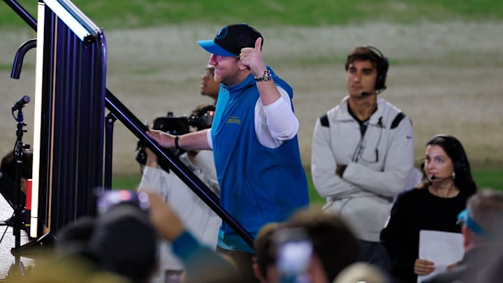 Jacksonville Jaguars head coach Liam Coen enters the stage Thursday, Jan. 30, 2025 at EverBank Stadium in Jacksonville, Fla. Jaguars fans got a chance to see the new head coach speak and give a warm welcome at the stadium. Jacksonville Jaguars head coach Liam Coen enters the stage Thursday, Jan. 30, 2025 at EverBank Stadium in Jacksonville, Fla. Jaguars fans got a chance to see the new head coach speak and give a warm welcome at the stadium.