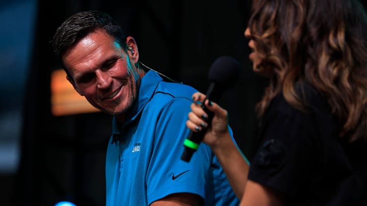 Jacksonville Jaguars hall of famer Tony Boselli smiles as team reporter Kainani Stevens interviews during the Duuuval Draft Party Thursday, April 25, 2024 at EverBank Stadium in Jacksonville, Fla. Thousands came out to watch the Jacksonville Jaguars choose in the 2024 NFL Draft. [Corey Perrine/Florida Times-Union]
