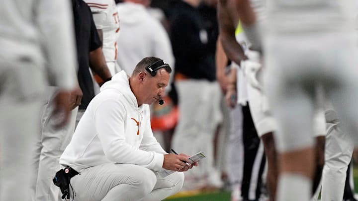Texas Longhorns head coach Steve Sarkisian looks at his play sheet against Ohio State Buckeyes in the second quarter of the Cotton Bowl Classic during the College Football Playoff semifinal game at AT&T Stadium in Arlington, Texas on January, 10, 2025. Texas Longhorns head coach Steve Sarkisian looks at his play sheet against Ohio State Buckeyes in the second quarter of the Cotton Bowl Classic during the College Football Playoff semifinal game at AT&T Stadium in Arlington, Texas on January, 10, 2025.