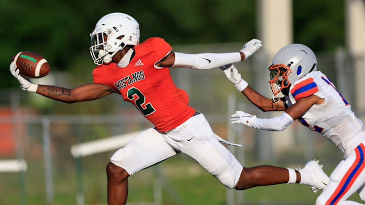 Mandarin's Jaime Ffrench makes a one-handed touchdown reception against Bolles' Santana Starks Mandarin's Jaime Ffrench makes a one-handed touchdown reception against Bolles' Santana Starks