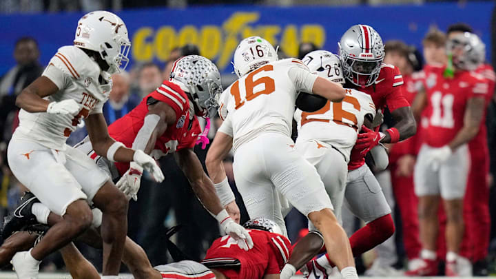 Texas Longhorns quarterback Arch Manning (16) runs the ball for a first down on fourth down in the second quarter of the Cotton Bowl Classic during the College Football Playoff semifinal game at AT&T Stadium in Arlington, Texas on January, 10, 2025. Texas Longhorns quarterback Arch Manning (16) runs the ball for a first down on fourth down in the second quarter of the Cotton Bowl Classic during the College Football Playoff semifinal game at AT&T Stadium in Arlington, Texas on January, 10, 2025.