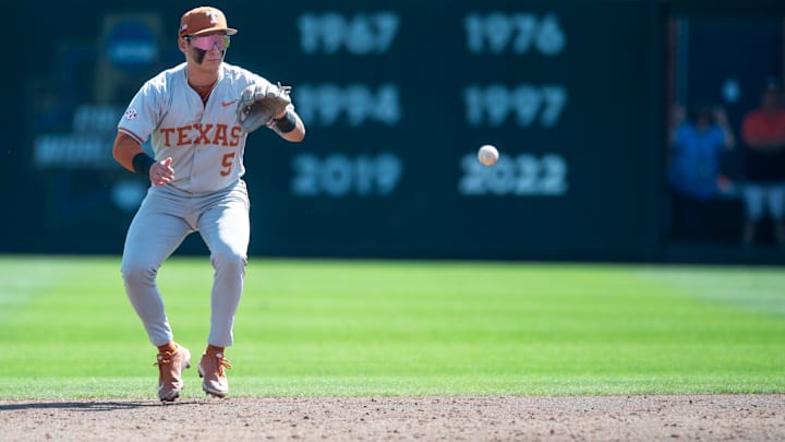 Texas Longhorns' Ethan Mendoza (5) fields a ground ball as Auburn Tigers take on Texas Longhorns at Plainsman Park.