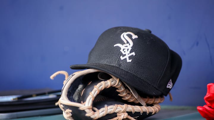 Jul 15, 2023; Atlanta, Georgia, USA; A detailed view of a Chicago White Sox hat and glove in the dugout against the Atlanta Braves in the first inning at Truist Park. Mandatory Credit: Brett Davis-Imagn Images Jul 15, 2023; Atlanta, Georgia, USA; A detailed view of a Chicago White Sox hat and glove in the dugout against the Atlanta Braves in the first inning at Truist Park. Mandatory Credit: Brett Davis-Imagn Images