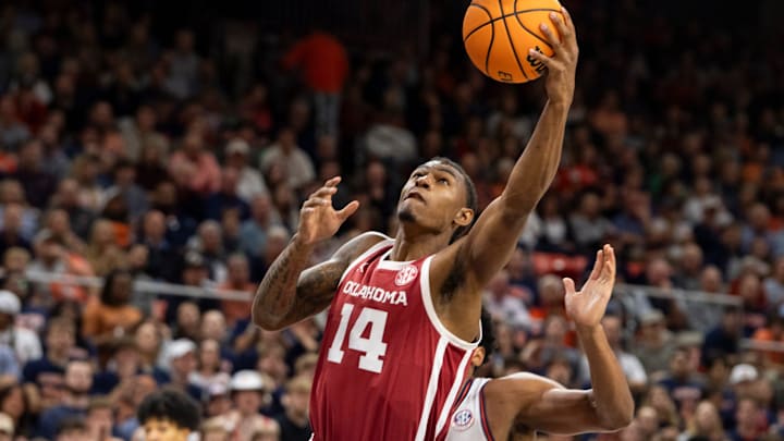 Oklahoma Sooners forward Jalon Moore (14) goes up for a layup as Auburn Tigers take on Oklahoma Sooners at Neville Arena in Auburn, Ala., on Tuesday, Feb. 4, 2025.