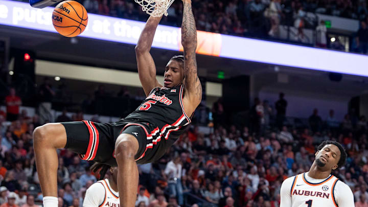 Houston Cougars center Chris Cenac Jr. (5) dunks the ball as Auburn Tigers take on the Houston Cougars at Legacy Arena in Birmingham, Ala. on Sunday, Nov. 16, 2025. Houston Cougars defeated Auburn Tigers 73-72.