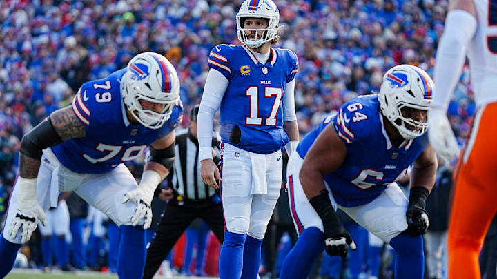 Buffalo Bills quarterback Josh Allen (17) looks at how players are lined up during the first half of the Buffalo Bills wild card game against the Denver Broncos at Highmark Stadium in Orchard Park on Jan. 12, 2025.