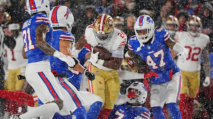 Bills defensive line descends on 49ers Jordan Mason during first half action of their home game against the San Francisco 49ers in Orchard Park on Dec. 1, 2024.