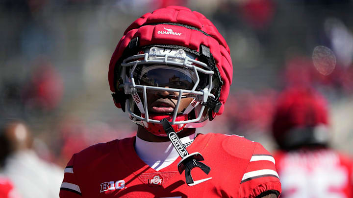 Ohio State Buckeye Jeremiah Smith (4) warms up before the start of the spring game at Ohio Stadium on April 12, 2025.