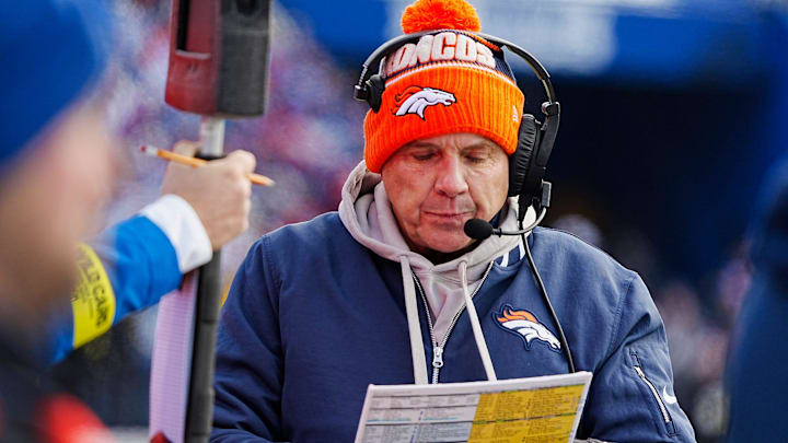 Denver Broncos head coach Sean Payton looks over the play sheet during the first half of the Buffalo Bills wild card game against the Denver Broncos at Highmark Stadium in Orchard Park on Jan. 12, 2025.