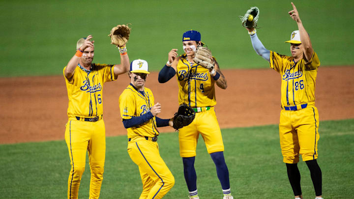 Savannah Bananas players dance on the mound as the Auburn Tigers face off with the Banana Ball All-Stars at Plainsman Park in Auburn, Ala. on Saturday, Oct. 25, 2025.