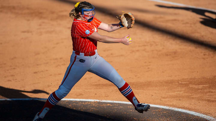 Florida Gators pitcher Keagan Rothrock (7) pitches during the SEC softball tournament championship game at Jane B. Moore Field in Auburn, Ala., on Saturday, May 11, 2024. Florida Gators defeated the Missouri Tigers 6-1.