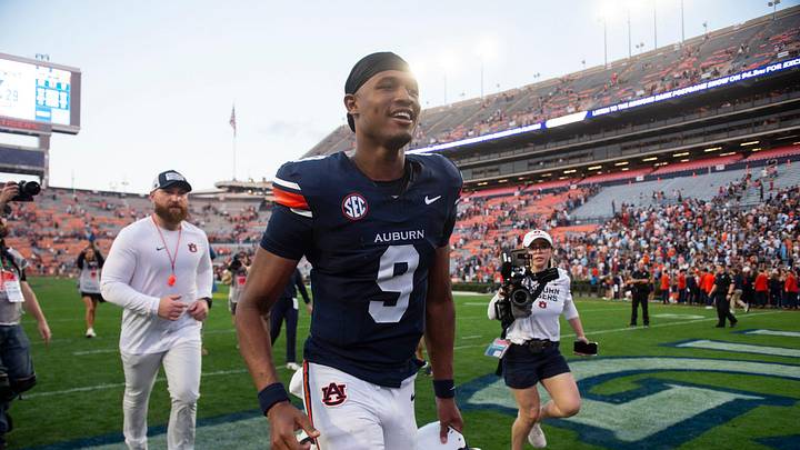 Auburn Tigers quarterback Deuce Knight (9) walks off the field after the game as Auburn Tigers take on Mercer Bears at Jordan-Hare Stadium in Auburn, Ala. on Saturday, Nov. 22, 2025. Auburn Tigers defeated the Mercer Bears 62-17.