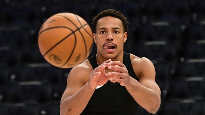 Memphis Grizzlies guard Desmond Bane warms up before game against the Milwaukee Bucks at Fiserv Forum. Memphis Grizzlies guard Desmond Bane warms up before game against the Milwaukee Bucks at Fiserv Forum.