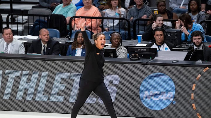 Tennessee Volunteers head coach Kim Caldwell talks with her team as Tennessee Volunteers face off with Texas Longhorns during the Sweet 16 at Legacy Arena in Birmingham, Ala., on Saturday, March 29, 2025. Texas Longhorns defeated Tennessee Volunteers 67-59 to advance to the Elite 8.