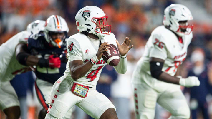 New Mexico Lobos quarterback Devon Dampier (4) looks to throw the ball as Auburn Tigers take on New Mexico Lobos at Jordan-Hare Stadium in Auburn, Ala., on Saturday, Sept. 14, 2024.