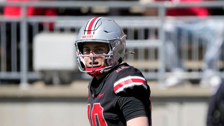 Ohio State quarterback Julian Sayin completed 17 of 24 passes for 175 yards and a touchdown in the spring game.
