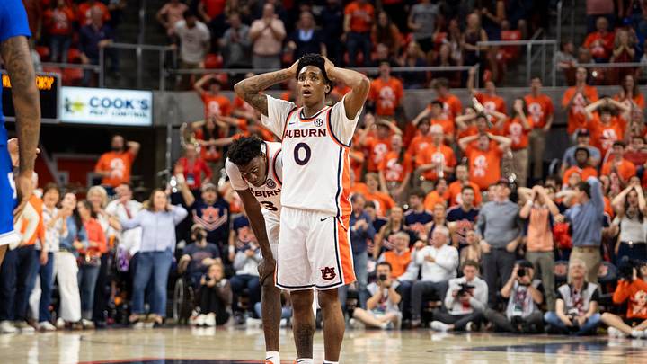 Auburn Tigers guard Tahaad Pettiford (0) reacts to the game winning play as Auburn Tigers take on Kentucky Wildcats at Neville Arena in Auburn, Ala. on Saturday, Feb. 21, 2026. Auburn Tigers defeated Kentucky Wildcats 75-74.