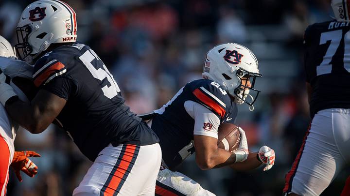 Auburn Tigers running back Jeremiah Cobb (23) runs the ball as Auburn Tigers take on Mercer Bears at Jordan-Hare Stadium in Auburn, Ala. on Saturday, Nov. 22, 2025. Auburn Tigers defeated the Mercer Bears 62-17.