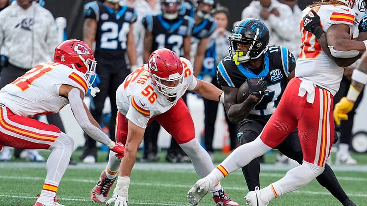 Carolina Panthers wide receiver Xavier Legette (17) runs for yards after catch chased by Kansas City Chiefs defensive end George Karlaftis Carolina Panthers wide receiver Xavier Legette (17) runs for yards after catch chased by Kansas City Chiefs defensive end George Karlaftis