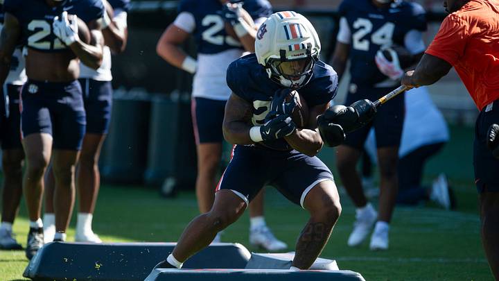 Auburn Tigers running back Omar Mabson II (29) runs drills during practice at Woltosz Football Performance Center. Auburn Tigers running back Omar Mabson II (29) runs drills during practice at Woltosz Football Performance Center.