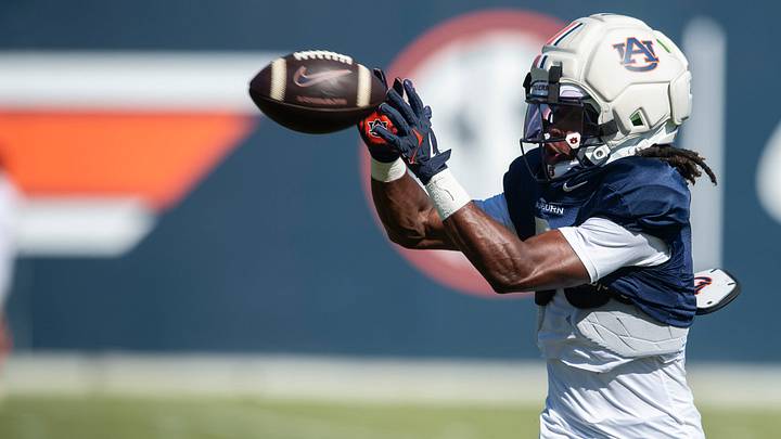 Auburn Tigers wide receiver Bryce Cain (6) runs drills during practice at Woltosz Football Performance Center in Auburn, Ala.