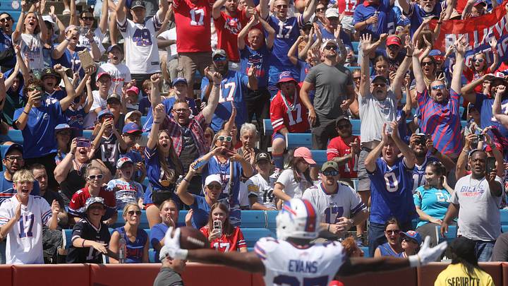 Fans celebrate with the Buffalo Bills' Darrynton Evans after he scored a touchdown during the first half of the preseason game against Carolina Panthers at Highmark Stadium in Orchard Park on Aug. 24, 2024. Fans celebrate with the Buffalo Bills' Darrynton Evans after he scored a touchdown during the first half of the preseason game against Carolina Panthers at Highmark Stadium in Orchard Park on Aug. 24, 2024.
