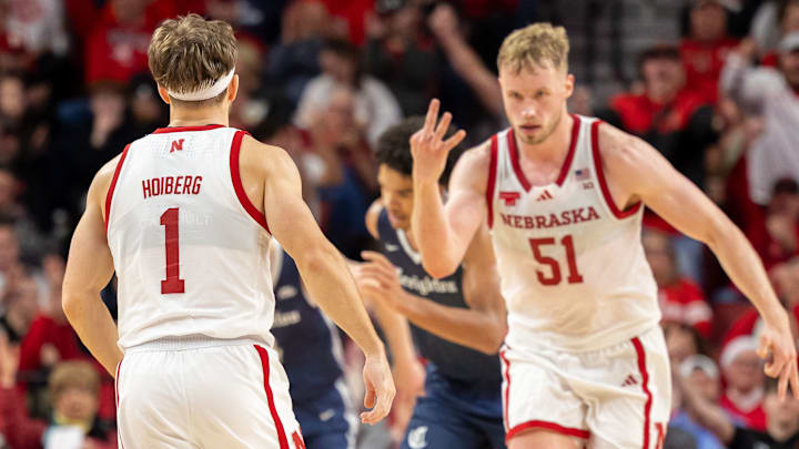 Rienk Mast signals to Sam Hoiberg after Hoiberg makes a three-pointer against Creighton. Rienk Mast signals to Sam Hoiberg after Hoiberg makes a three-pointer against Creighton.