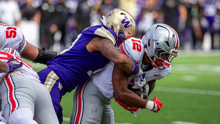 Xe'ree Alexander brings down Ohio State's C.J. Donaldson on fourth-and-1 at the UW 4. Xe'ree Alexander brings down Ohio State's C.J. Donaldson on fourth-and-1 at the UW 4.