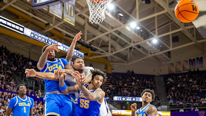 Lathan Sommerville and a host of UCLA players battle for the ball. Lathan Sommerville and a host of UCLA players battle for the ball.