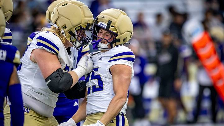 John Mills lets Beck Walker how pleased he was by the walk-on's Spring Game run. John Mills lets Beck Walker how pleased he was by the walk-on's Spring Game run.