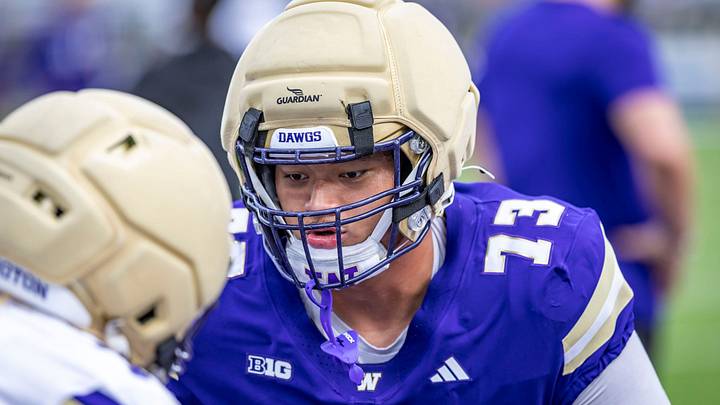 Champ Taulealea gets ready to hit someone in spring ball. Champ Taulealea gets ready to hit someone in spring ball.
