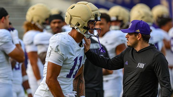 Freshman edge rusher Ramzak Fruean gets directions from edge coach Aaron Van Horn. Freshman edge rusher Ramzak Fruean gets directions from edge coach Aaron Van Horn.