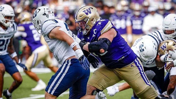UW guard John Mills stays on his block against Utah State. UW guard John Mills stays on his block against Utah State.