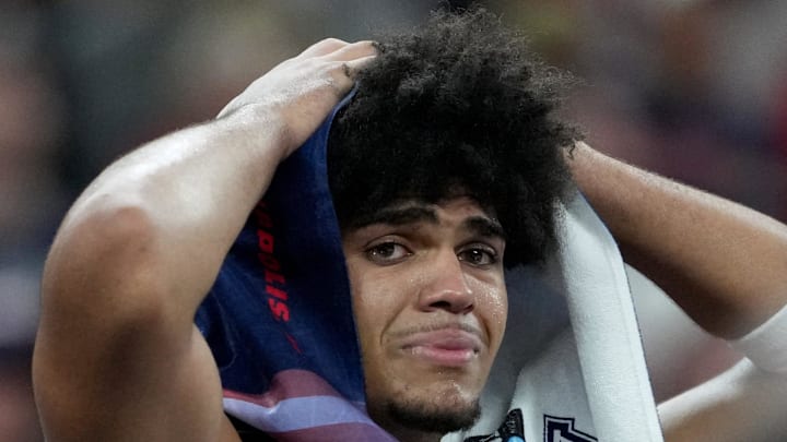 Arizona Wildcats forward Koa Peat (10) cries Saturday, April 4, 2026, after the team’s 91-73 loss to the Michigan Wolverines during the Final Four at Lucas Oil Stadium in Indianapolis.