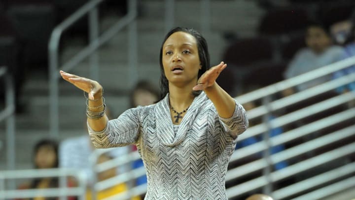 Mar 6, 2011; Los Angeles, CA, USA; Washington Huskies coach Tia Jackson gestures during the game against the Southern California Trojans at the Galen Center. USC defeated Washington 65-61 in overtime. Mandatory Credit: Kirby Lee/Image of Sport-Imagn Images